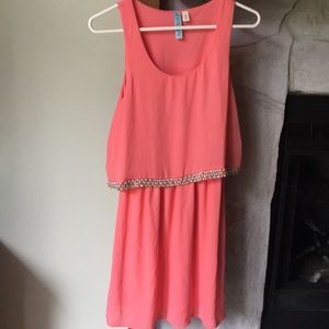 Pink knee length dress with jewel accents